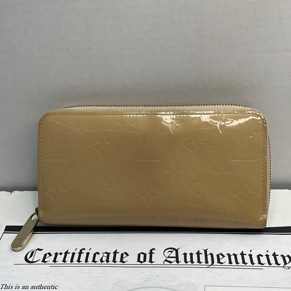 Authentic LOUIS VUITTON tan vernis leather wallet with COA
